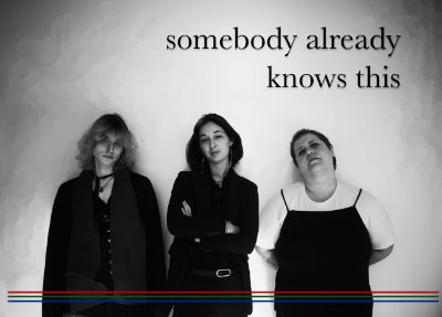 Black and White picture of three people standing against a wall with the phrase "somebody already knows this" in the top right corner